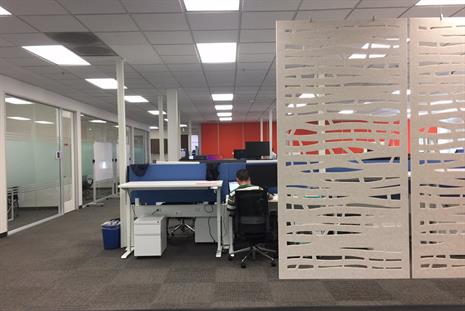 Open Area Workstations, Adjustable Height Desks with Mobile Storage, Ergonomic Task Chairs, Power and Data Beam, and both Workstation and Area Privacy Panels